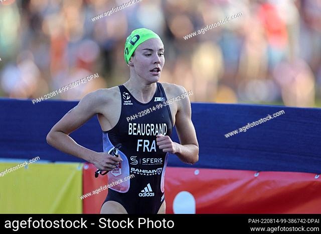 14 August 2022, Bavaria, Munich: European Championships, Triathlon, Relay, Mixed, at the Olympic Park. Emma Lombardi from France comes out of the water
