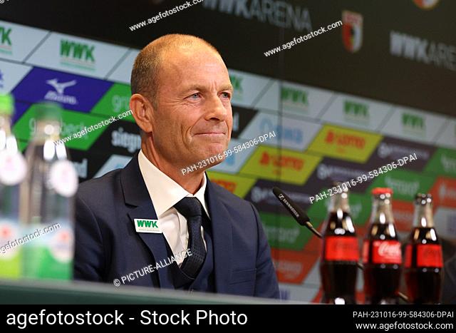 16 October 2023, Augsburg: Jess Thorup sits on the podium during his introduction as the new coach of FC Augsburg 1907. Augsburg's new hopeful is Jess Thorup