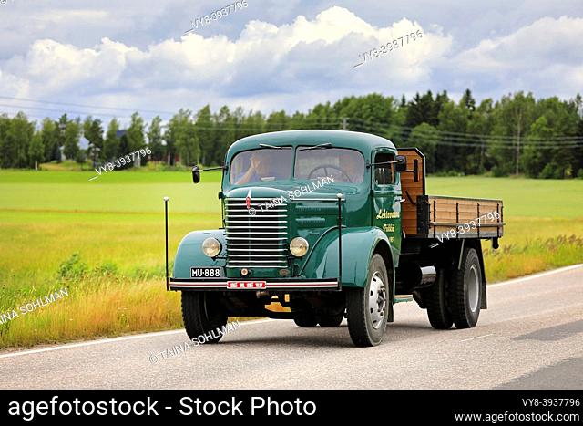Green Sisu L60 tipper truck year 1951 of Lehtovaara on truck rally by the Vintage Truck Association of Finland. Suomusjärvi, Finland