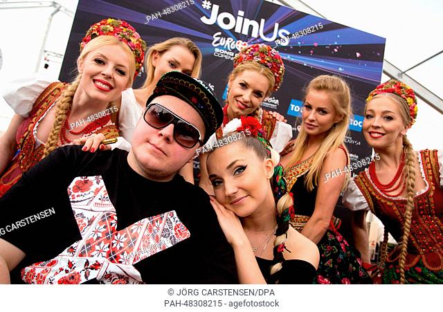 Cleo (C) representing Poland poses with dancers during a press conference at the Eurovision Song Contest 2014 in Copenhagen, Denmark, 3 May 2014