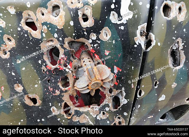 RUSSIA, ST PETERSBURG - NOVEMBER 20, 2023: A bullet riddled ""Bukhanka"" ambulance from the zone of Russia's special military operation is on display in...