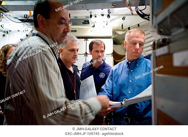 Astronauts Mark Polansky (foreground), STS-127 commander; Dave Wolf, Tom Marshburn, Tim Kopra and Canadian Space Agency's Julie Payette (mostly obscured at...