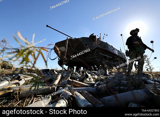 RUSSIA, ZAPOROZHYE REGION - OCTOBER 31, 2023: A serviceman is seen at a BMD-2 amphibious infantry fighting vehicle during a combat mission by Russian Army...