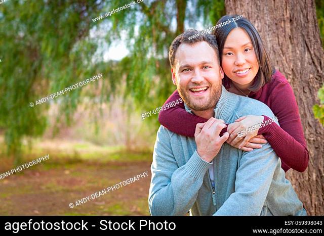 Mixed Race Caucasian and Chinese Couple Portrait Outdoors