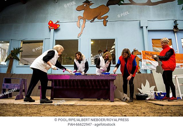 Princess Beatrix and Princess Aime, members of the Dutch Royal Family, volunteering for people with disabilities at a Manege in Den Dolder, Netherlands