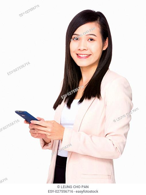 Young Businesswoman use of the mobile phone