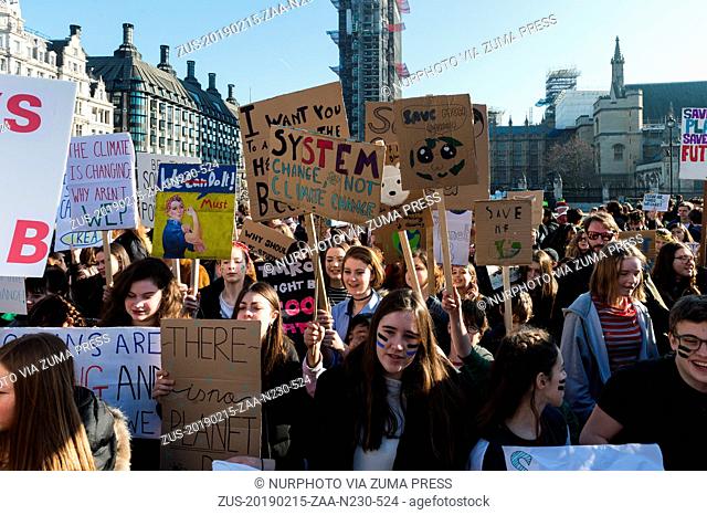 February 15, 2019 - London, England, United Kingdom - Thousands of young people gather in Parliament Square in central London to protest against the...