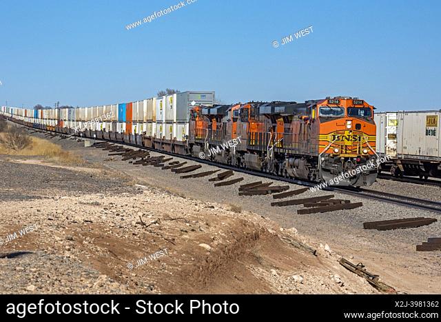 Bovina, Texas - A Burlington Northern train heals double-stacked shipping containers