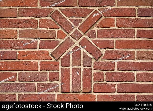 detail in the brick half-timbered facade at a sheepfold near timmerloh, near soltau, lueneburg heath nature reserve, germany, lower saxony