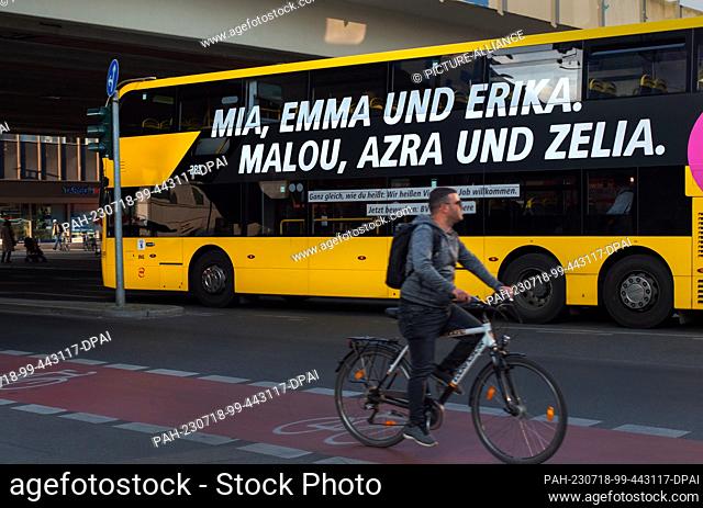 20 May 2023, Berlin: 20.05.2023, Berlin. The names ""Mia, Emma and Erika, Malou, Azra and Zelia"" are written on a yellow bus of the Berlin public transport...
