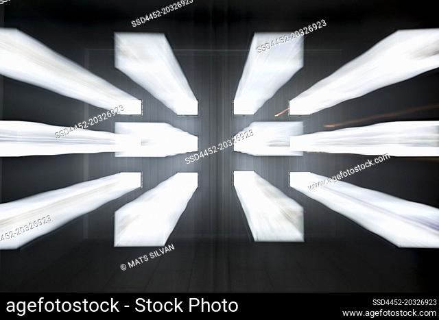 Window Display with Light Effect at Night in Switzerland