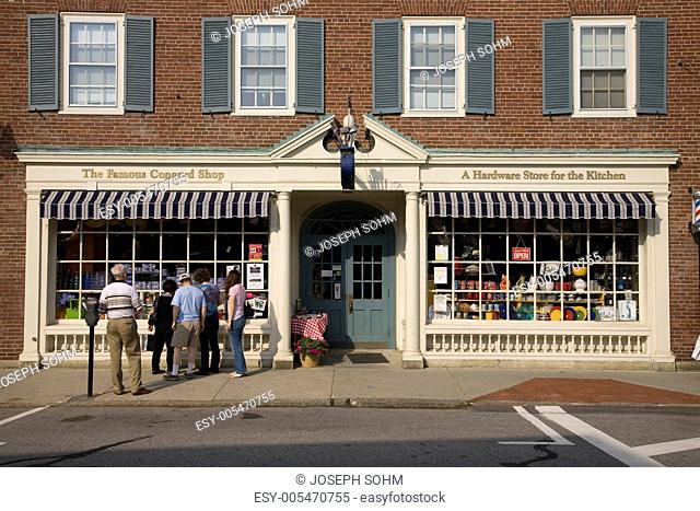 Tourists look into window of The Famous Concord Shop in historic Concor, MA outside of Boston on Memorial Day, 2011