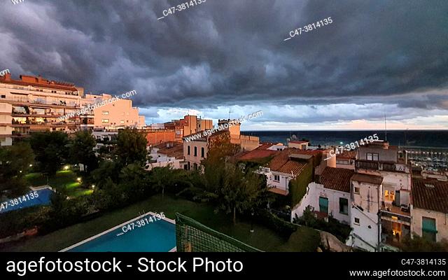 Stormy clouds at sunset, dramatic sky, coastal landscape, weather scenery El Masnou, Barcelona, Spain