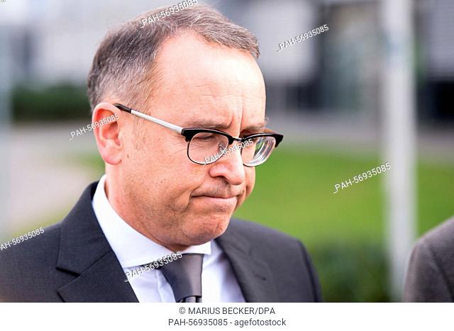 Germanwings manager Oliver Wagner purses his lips during the course of a press statement in Cologne, central Germany, 24 March 2015 following the news of an...