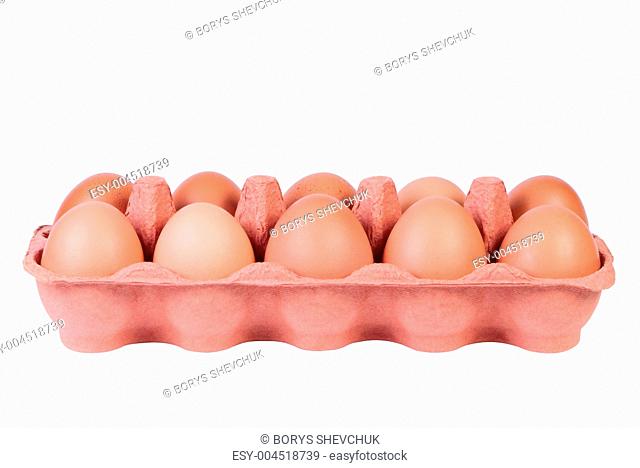 Chicken eggs in carton tray isolated on white background