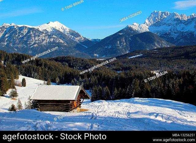 Winter hike near Mittenwald, Elmau, Klais, Europe, Germany, Bavaria, Upper Bavaria, Werdenfels, winter, hay barn in the sunshine in front of the Karwendel...