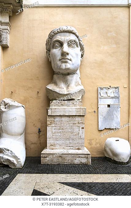 The head and hand of the Colossus of Constantine in the courtyard of the Palazzo dei Conservatori, part of the Capitoline Museums, Rome, Italy