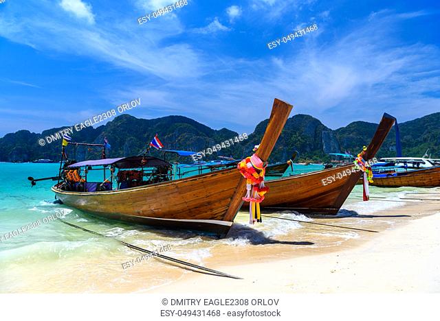 Long tail boats on tropical beach, Phi Phi Don island, Andaman sea, Krabi, Thailand