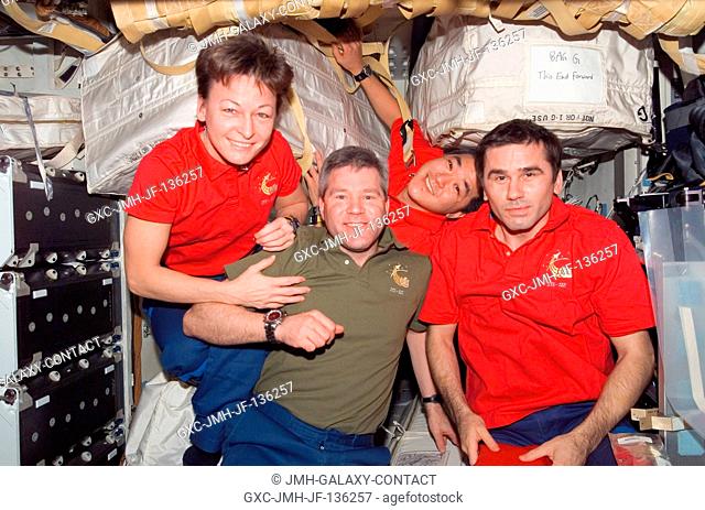 NASA astronauts Peggy Whitson, Expedition 16 commander; Steve Frick (second left), STS-122 commander; Daniel Tani, STS-122 mission specialist; and Russian...
