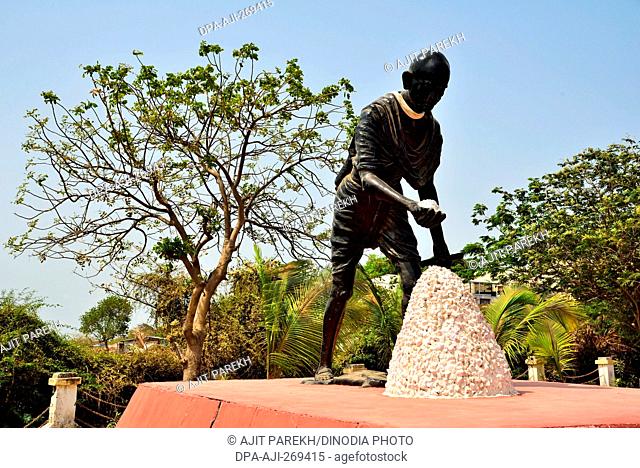 Statue of Mahatma Gandhi collecting salt, Dandi, Gujarat, India, Asia