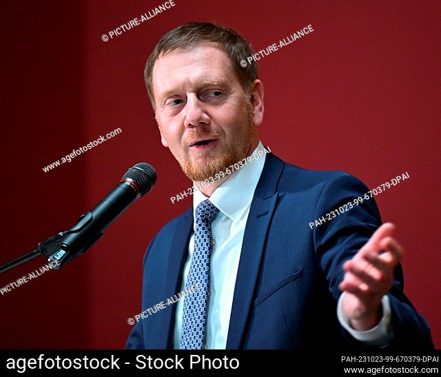 23 October 2023, Saxony, Dresden: Michael Kretschmer (CDU), Minister President of Saxony, speaks in front of the painting ""Campagna Landscape"" by Dutchman Jan...