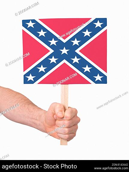 Hand holding small card, isolated on white - Flag of the Confederacy