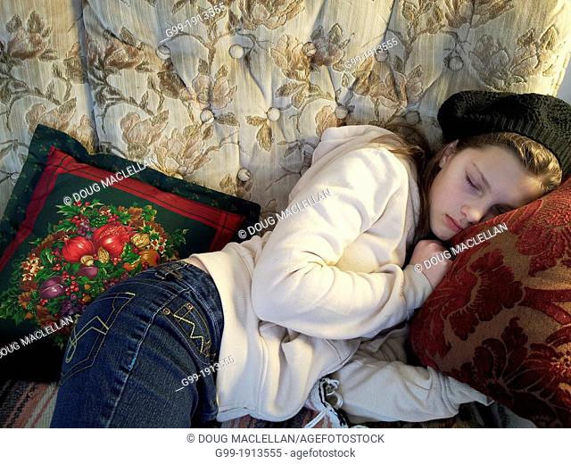 Girl, 11 years old, sleeping on couch, Sault Ste Marie, Ontario, Canada