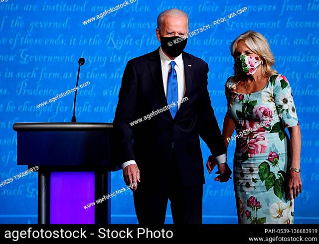 Democratic presidential candidate former Vice President Joe Biden stands with his wife Dr Jill Biden after the final presidential debate with Republican...