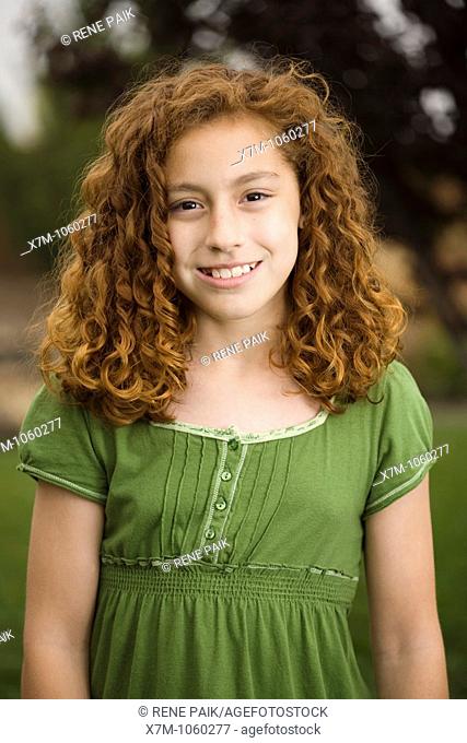 Smiling young red-headed girl  Mixed race, Mexican and caucasian