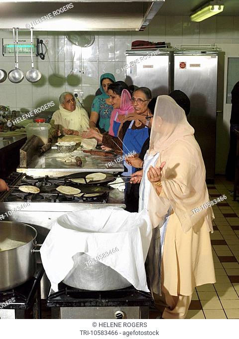 Khalsa Centre Tooting London England Women Making Chapatis in Kitchen on Anniversary of Death of Guru Tegh Bahadur