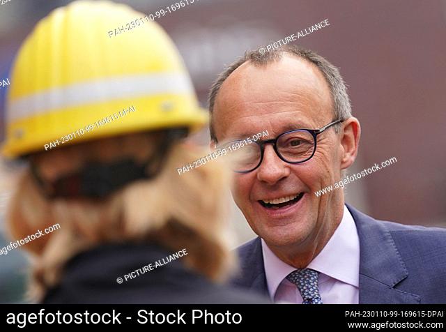 10 January 2023, Hamburg: Friedrich Merz (M), Chairman of the CDU party, arrives for a visit to the Aurubis AG plant site