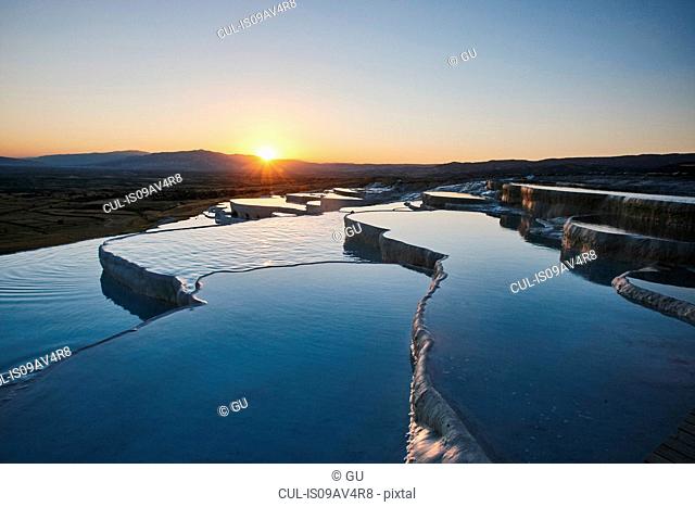 Hot spring terraces at sunset, Pamukkale, Anatolia, Turkey