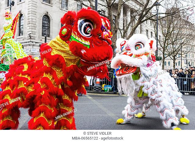 England, London, Chinese New Year Parade, Child Wearing Chinese Lion Mask