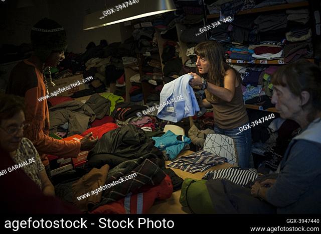Some volunteers offers clothes to change to African migrants. Irun (Spain). October 13, 2018. As the number of migrants arriving on the coasts of southern Spain...