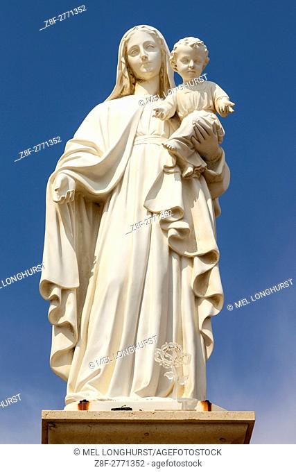Statue of Mary holding baby Jesus, Punta Secca, Santa Croce Camerina, Sicily, Italy
