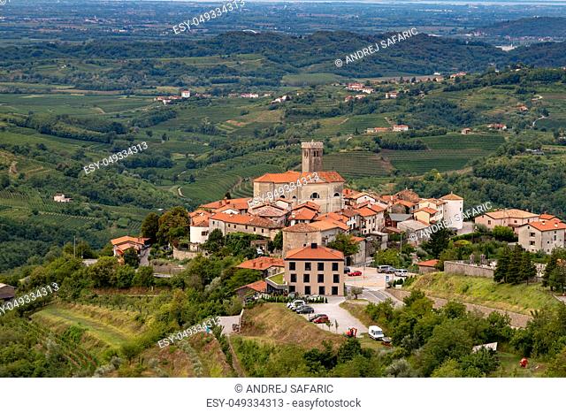 Panoramic view of Smartno in Gorska Brda, Slovenia from above with surrounding vineyards, olive plantations and orchards