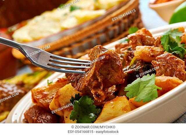 Serbian Goulash-Paprikash, Balkan cuisine cuisine, Traditional assorted dishes, Top view.ade with onions, olive oil, lamb, bay leaves, tomato paste, water