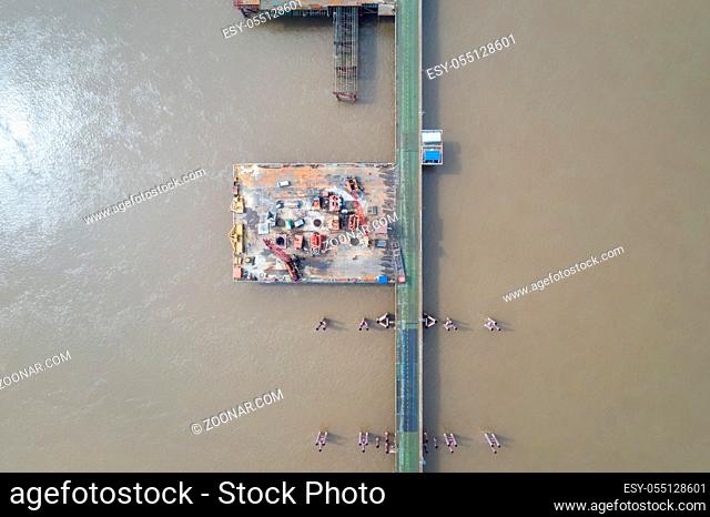 aerial view of bridge construction site on the yangtze river, China