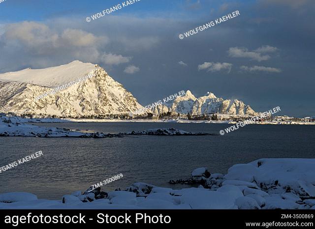 View of snow covered mountains from Vestvagoy Island, the second major island in the Lofoten archipelago, Nordland County, Norway