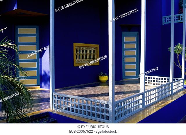 The Jardin Majorelle owned by Yves St Laurent. Corner of balcony with walls painted vivid blue