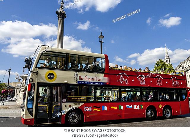 An 'Original Tour' Tour Bus Passing Nelson's Column In Trafalgar Square, London, UK