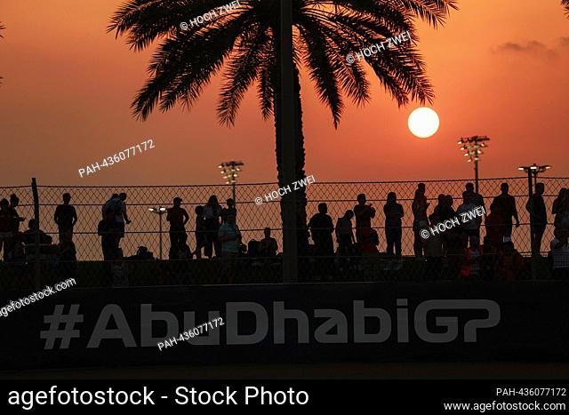 Spectators at sunset, F1 Grand Prix of Abu Dhabi at Yas Marina Circuit on November 24, 2023 in Abu Dhabi, United Arab Emirates. (Photo by HOCH ZWEI)