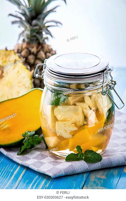 Summer fresh fruit Flavored infused water mix of pineapple, mango and mint leaf