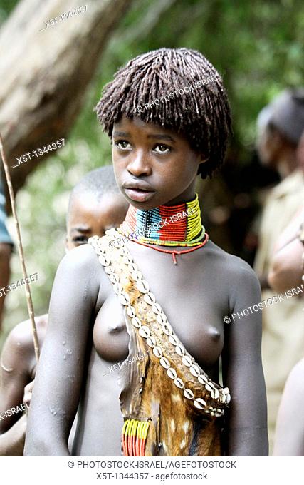 Africa, Ethiopia, Omo River Valley Hamer Tribe young topless female member