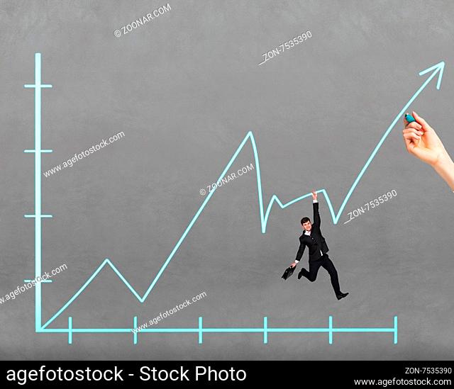 Man holding on graph drawed by male hand