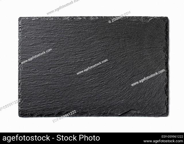 Black slate cutting board isolated on white background. Top view