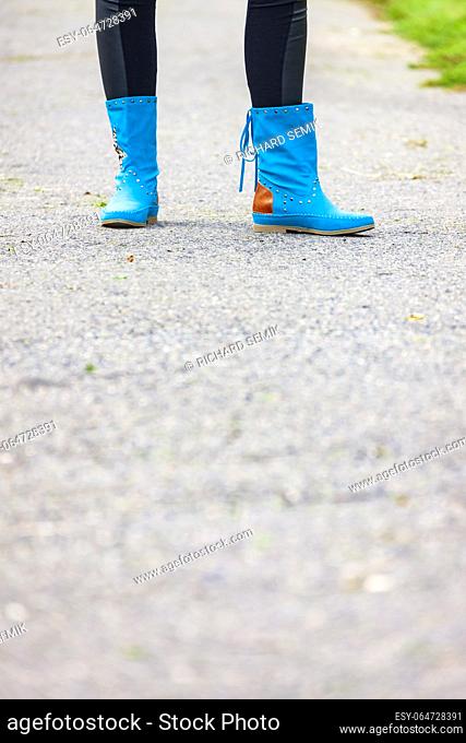 Young woman wearing fashionable boots