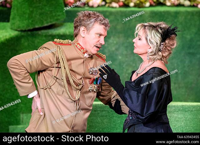 RUSSIA, MOSCOW - OCTOBER 26, 2023: Actors Vadim Kolganov (L) as Colonel Sir Francis Chesney and Tatyana Vedeneyeva as Donna Lucia perform during the premiere of...