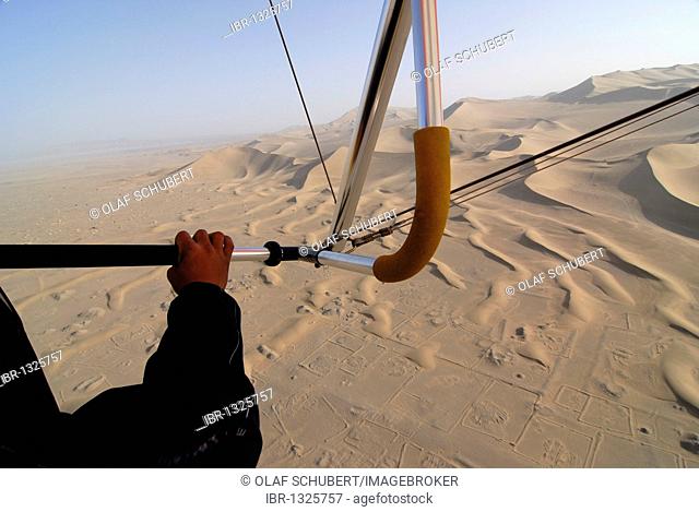 Microlight flight over the Gobi Desert, aerial view of sand dunes and archeological excavation sites in the Gobi Desert, Silk Road, Dunhuang, Gansu, China, Asia