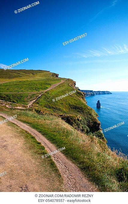 The famous Cliffs of Moher are sea cliffs located at the southwestern edge of the Burren region in County Clare, Ireland